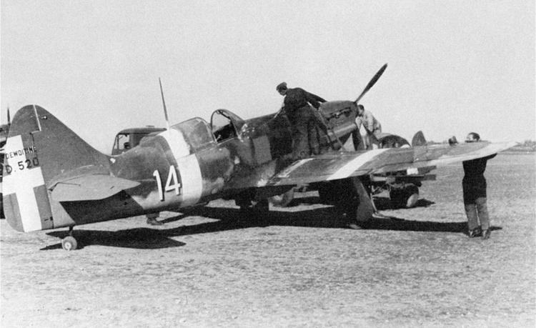 Black and white WWII-era photo of Soviet plane #14; two inspect cockpit, one stands by tail.