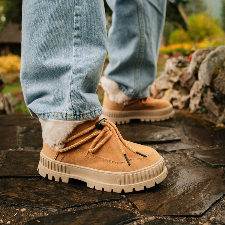 Pallashock Lo Hiver boots in Irish Brown on a stone walkway